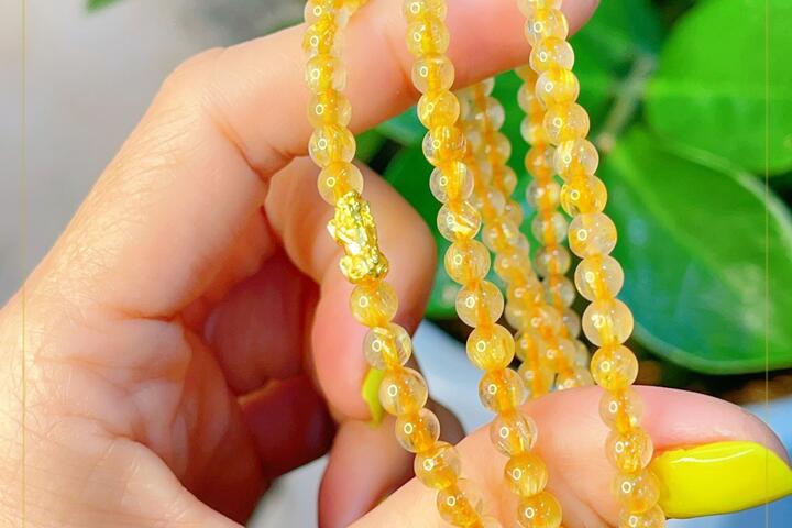 CHUỖI THẠCH ANH TÓC VÀNG 5 LY MIX TỲ HƯU - THIỆN THÀNH GROUP